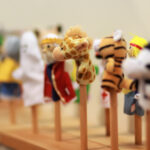 Toy puppets on wooden sticks for preschool nursery theatre. Puppet theatre art.